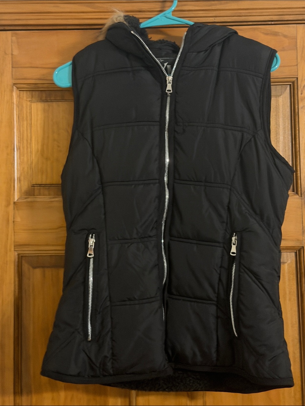 YMI black puffer vest with faux fur hood
